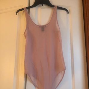 Scoop neck, mesh bodysuit! Two snaps on the bottom